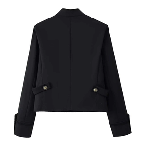 Women's black cropped blazer jacket with shoulder pads and gold button details, back view