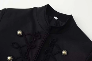 Detail of black stand collar jacket with intricate rope knots and gold metal buttons