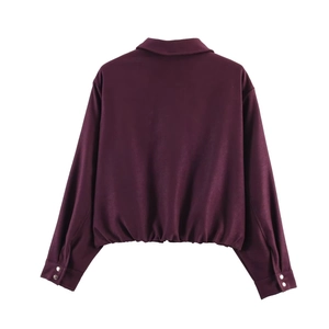 Back view of burgundy bomber jacket featuring a lapel collar and elasticated hem details