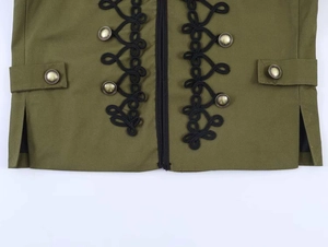 Detail of olive green blazer with black braided toggles and bronze sphere metal buttons