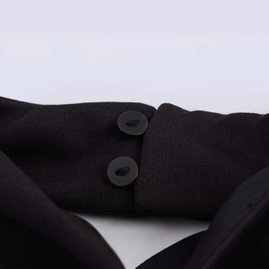 Slim fit black sleeveless backless dress featuring fine texture and double button details