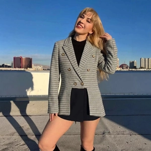 Women's houndstooth blazer with double-breasted buttons and notched lapel design