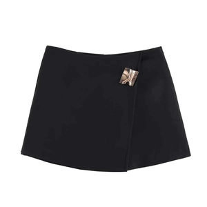 Women's high waist asymmetric black mini skirt with stylish square gold buckle detail