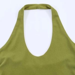 Green high waist pleated halter neck dress with deep U-neckline and minimalist design