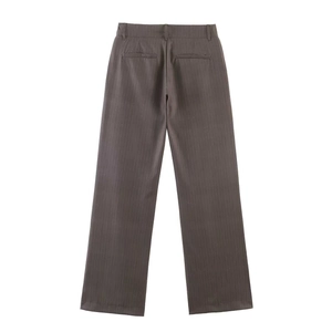 Detail of grey pinstripe wide-leg trousers featuring belt loops and back welt pockets