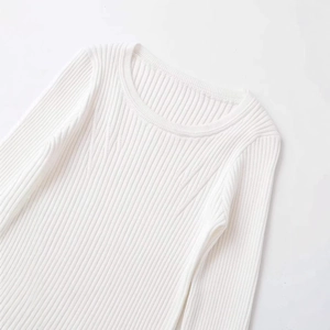 White long sleeve crew neck ribbed knit top with stylish asymmetrical hem for women