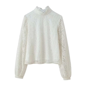 Elegant white lace top with puff sleeves and high neck featuring intricate floral embroidery