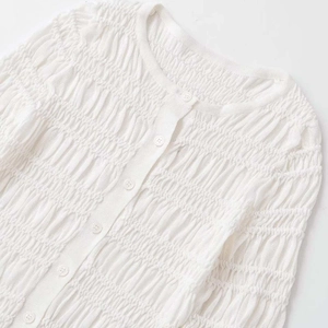 Slim fit white knit cardigan with pleated texture and matching buttons for women