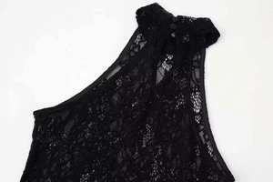 Detail of black lace halter neck with high collar and floral hollow embroidery texture