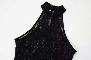 Close-up of floral lace halter neck design with back button closure and size S label