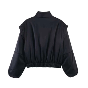 Rear view of black cropped bomber jacket with stand collar and elastic hem detail