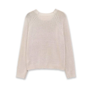 Detailed view of beige knit sweater with ribbed crew neck and high-quality fabric texture