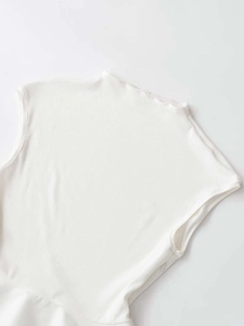 Detailed macro view of white ribbed sleeveless top with elegant mockup high collar design