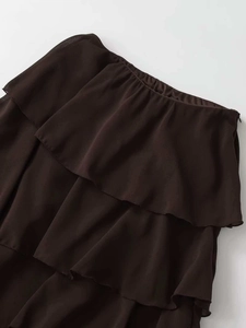Detail of dark chocolate tiered ruffle midi skirt with subtle side invisible zipper