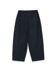 Detail view of black elastic waist quick-dry pants featuring two symmetrical back pockets