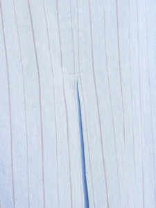 Macro detail of light blue pinstripe fabric showing fine texture and sewing craft