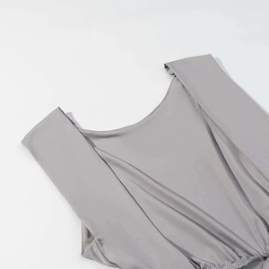Detailed view of the grey sleeveless top showing premium satin fabric and ruched texture