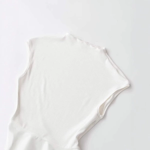 Sleeveless white turtleneck ribbed knit top for women with minimalist slim fit design