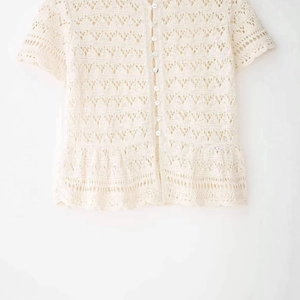 Elegant cream crochet knit short sleeve cardigan with floral hollow lace and ruffles