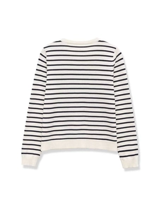 Detail of classic black and white striped knit sweater with ribbed cuffs and hem
