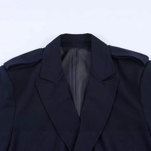 Classic navy blue double-breasted blazer with peaked lapels and shoulder epaulettes