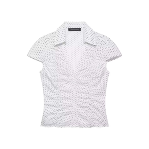 Chic women's white short sleeve blouse with black polka dots and pleated front detail