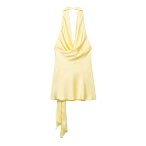 Pale yellow satin halter dress featuring a cowl neck and backless tie-up design