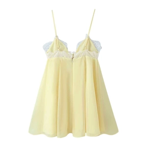 Pale yellow lace slip dress with sheer mesh fabric and white lace trim detail