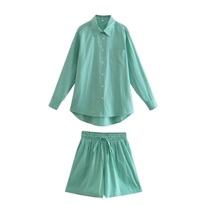 Women's two-piece green and white striped set with long sleeve shirt and drawstring shorts