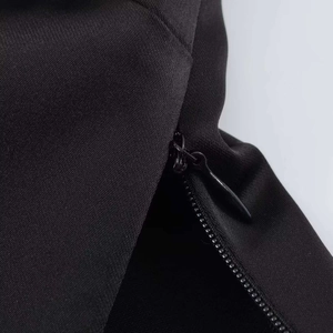 Macro shot of high-quality invisible zipper on black woven fabric with twill texture
