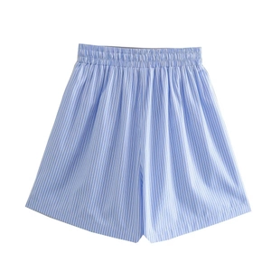 Detailed view of women's light blue striped shorts with elastic high waist and pleats
