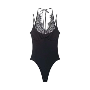 Detailed view of black lace bodysuit featuring floral patterns and eyelash lace trim
