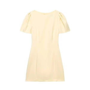 Slim fit pale yellow mini dress with puff sleeves and pocket detail for summer wear
