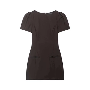 Close-up of short sleeve mini dress with puff sleeves and decorative pocket details