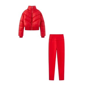 Vibrant red two-piece slim fit winter sports set with puffer jacket and high waist yoga pants