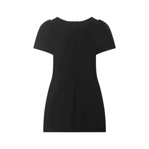 Back view of black mini dress featuring a concealed zipper and subtle puff sleeves
