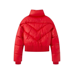 Detail of red shiny puffer jacket featuring V-shaped quilting and high stand collar