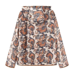 Macro view of vintage floral print pattern and lightweight hooded windbreaker fabric texture