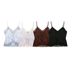 Detail of four satin camisoles with delicate lace trim and drawstring waist in multiple colors