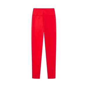 Detailed flat lay of red high-waisted yoga leggings in smooth elastic fabric