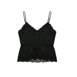 Detail of black satin camisole featuring eyelash lace trim, V-neck, and drawstring waist