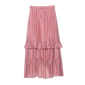 Pink tiered ruffle skirt with pleated texture and high waist minimalist summer design