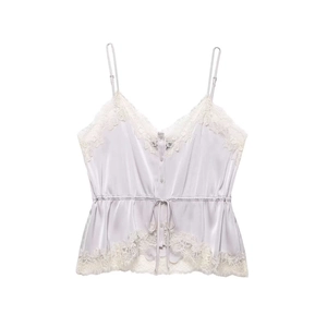 Detail of lavender satin top with white eyelash lace trim and adjustable drawstring waist