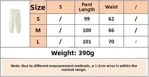 Size guide table for white loose lace wide-leg trousers with pant length and waist details