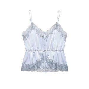 Detail of light blue lace camisole showing V-neck trim and adjustable drawstring waist