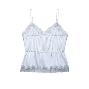 Detail of silk satin camisole with delicate grey lace trim and adjustable spaghetti straps