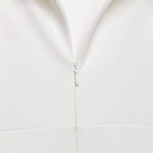 Minimalist white short sleeve dress featuring a discreet invisible back zipper closure