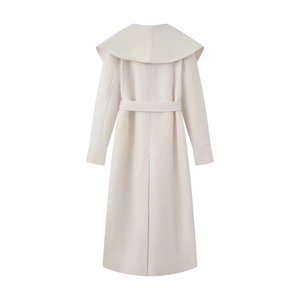 Back view of a long cream wool coat featuring a large lapel collar and adjustable belt