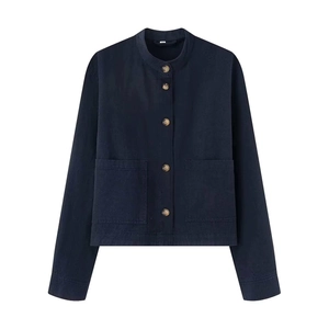 Classic dark blue denim jacket with round neck and brown buttons in a stylish flat lay