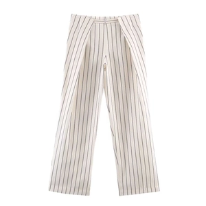 Detail of high-waisted wide-leg striped trousers with elegant pleated waist design